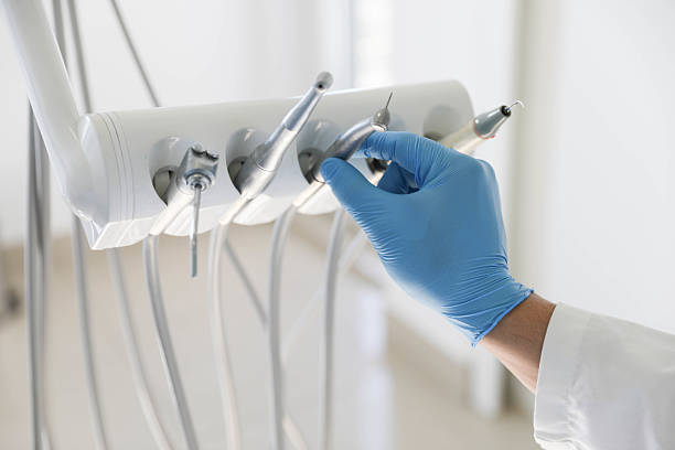 Professional Tooth Extraction technician working in Lapeer County County, MI